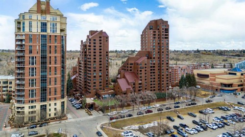 C400-500 Eau Claire Avenue Sw, Calgary, AB - Outdoor With Facade