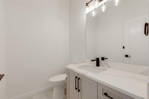 460 Rivercrest View, Cochrane, AB - Indoor Photo Showing Bathroom