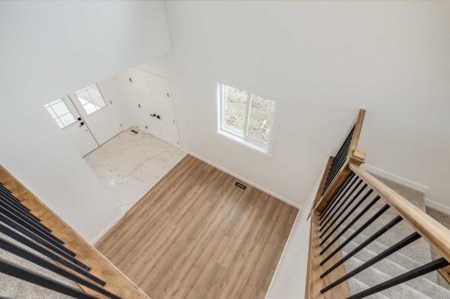 460 Rivercrest View, Cochrane, AB - Indoor Photo Showing Other Room