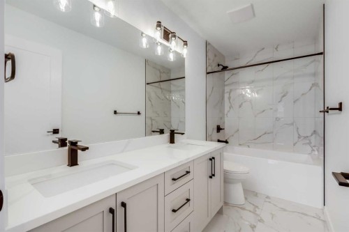 460 Rivercrest View, Cochrane, AB - Indoor Photo Showing Bathroom