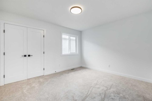 460 Rivercrest View, Cochrane, AB - Indoor Photo Showing Other Room