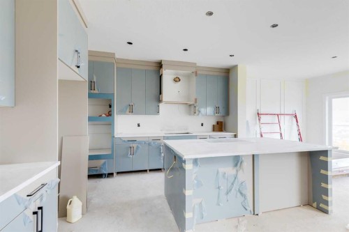 460 Rivercrest View, Cochrane, AB - Indoor Photo Showing Kitchen
