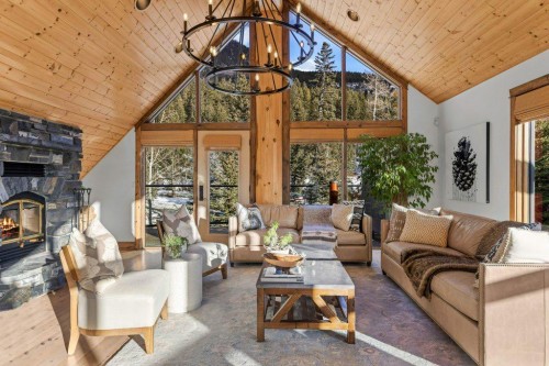 521 Silvertip Road, Canmore, AB - Indoor Photo Showing Living Room With Fireplace