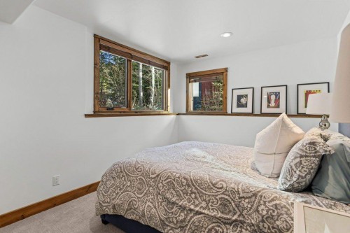 521 Silvertip Road, Canmore, AB - Indoor Photo Showing Bedroom