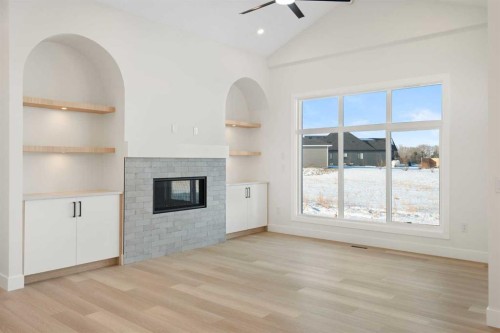 290 Muirfield Crescent, Lyalta, AB - Indoor With Fireplace
