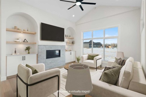 290 Muirfield Crescent, Lyalta, AB - Indoor Photo Showing Living Room With Fireplace