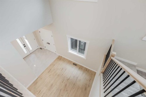 468 Rivercrest View, Cochrane, AB - Indoor Photo Showing Other Room