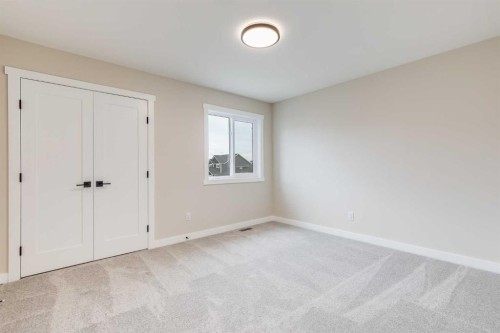 468 Rivercrest View, Cochrane, AB - Indoor Photo Showing Other Room