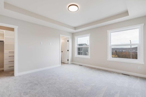 468 Rivercrest View, Cochrane, AB - Indoor Photo Showing Other Room