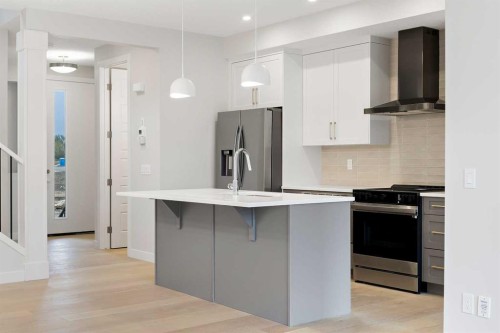 430 River Avenue, Cochrane, AB - Indoor Photo Showing Kitchen With Upgraded Kitchen