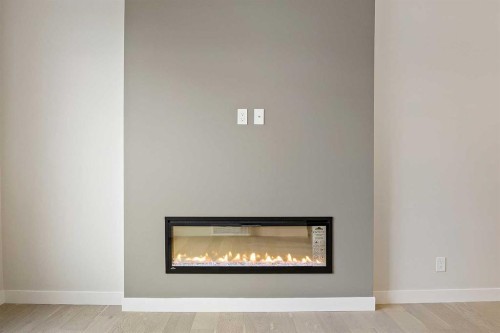 430 River Avenue, Cochrane, AB - Indoor Photo Showing Living Room With Fireplace