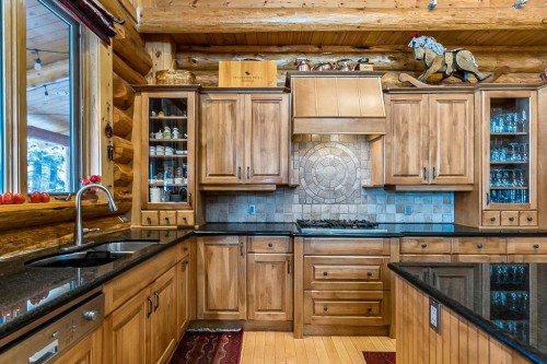 104 White Avenue, Bragg Creek, AB - Indoor Photo Showing Kitchen With Double Sink
