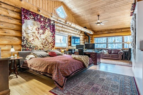 104 White Avenue, Bragg Creek, AB - Indoor Photo Showing Bedroom