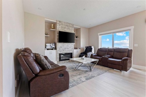146 Muirfield Boulevard, Lyalta, AB - Indoor Photo Showing Living Room With Fireplace