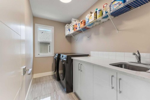 146 Muirfield Boulevard, Lyalta, AB - Indoor Photo Showing Laundry Room
