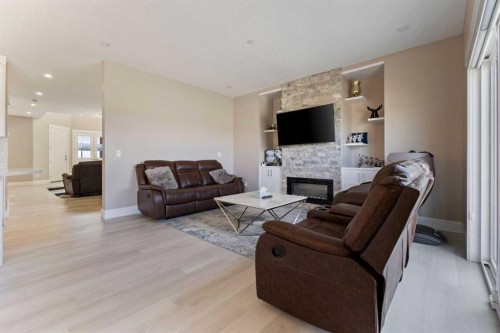 146 Muirfield Boulevard, Lyalta, AB - Indoor Photo Showing Living Room With Fireplace