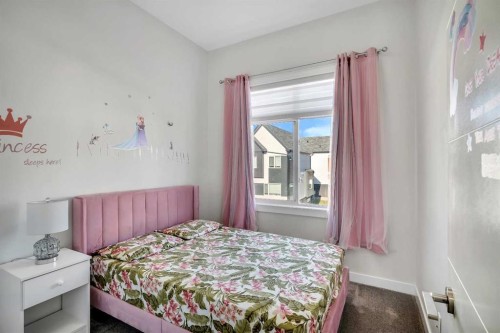 404-1530 Bayside Avenue Sw, Airdrie, AB - Indoor Photo Showing Bedroom