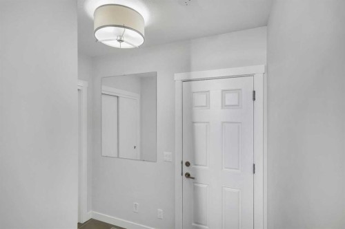 404-1530 Bayside Avenue Sw, Airdrie, AB - Indoor Photo Showing Other Room