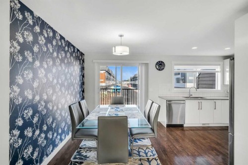 404-1530 Bayside Avenue Sw, Airdrie, AB - Indoor Photo Showing Dining Room