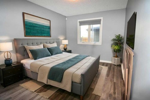 106 Eldorado Road Se, Airdrie, AB - Indoor Photo Showing Bedroom