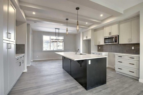 434 River Avenue, Cochrane, AB - Indoor Photo Showing Kitchen With Upgraded Kitchen
