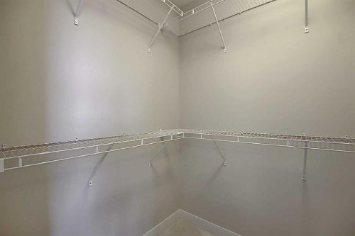 434 River Avenue, Cochrane, AB - Indoor With Storage