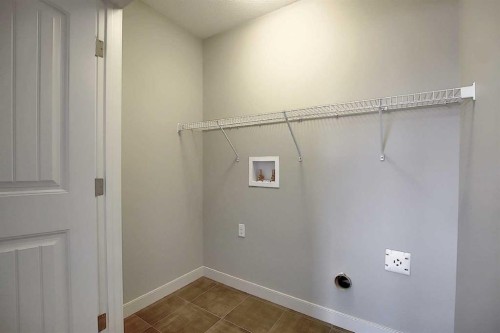 434 River Avenue, Cochrane, AB - Indoor With Storage