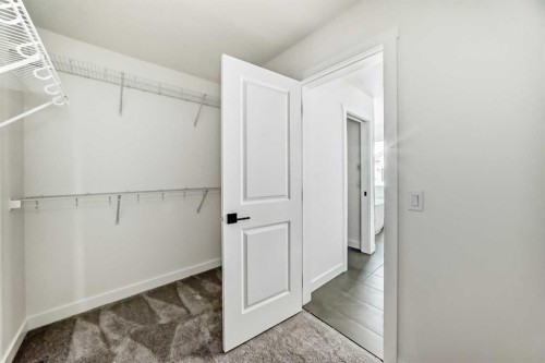 6 Appaloosa Way, Cochrane, AB - Indoor With Storage