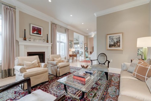 107 Lougheed Circle, Banff, AB - Indoor Photo Showing Living Room With Fireplace