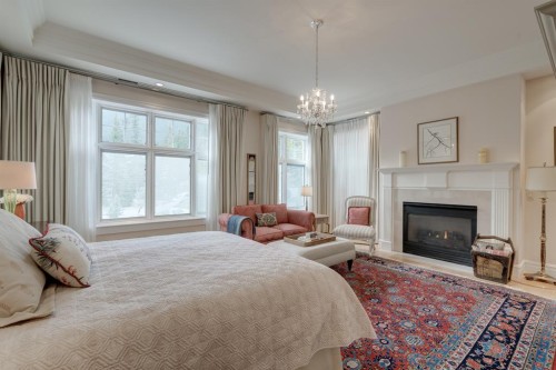 107 Lougheed Circle, Banff, AB - Indoor Photo Showing Bedroom With Fireplace