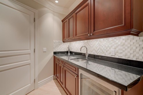 107 Lougheed Circle, Banff, AB - Indoor Photo Showing Kitchen With Double Sink