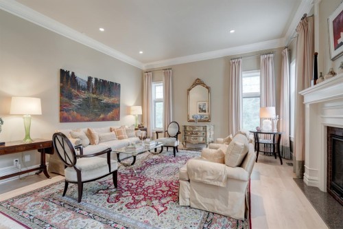 107 Lougheed Circle, Banff, AB - Indoor Photo Showing Living Room With Fireplace