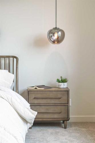 329 Limestone Bay, Balzac, AB - Indoor Photo Showing Bedroom