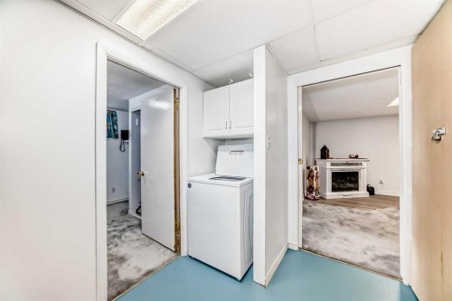 708 75 Avenue Sw, Calgary, AB - Indoor Photo Showing Laundry Room