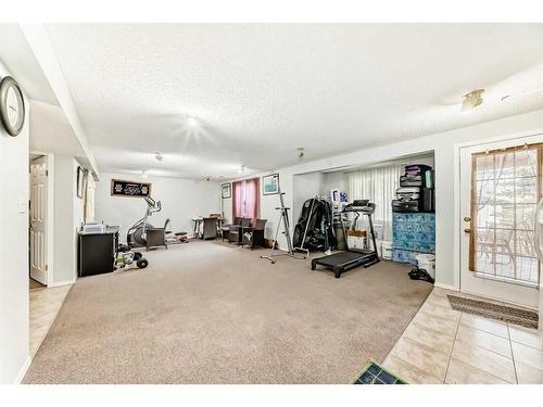 158 Panamount Drive Nw, Calgary, AB - Indoor Photo Showing Gym Room