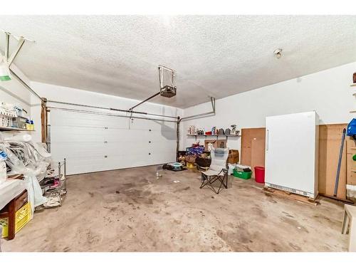 158 Panamount Drive Nw, Calgary, AB - Indoor Photo Showing Garage
