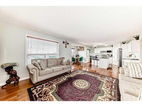 158 Panamount Drive Nw, Calgary, AB - Indoor Photo Showing Living Room