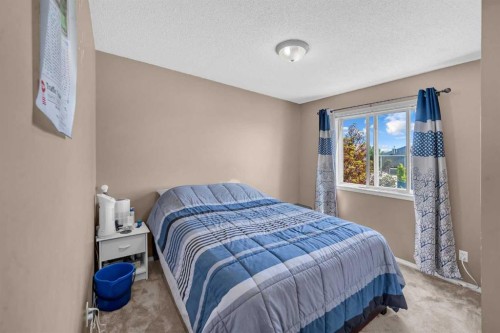 6 Saddlemont Way Ne, Calgary, AB - Indoor Photo Showing Bedroom