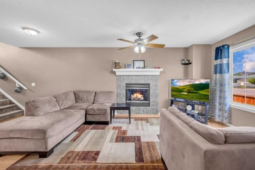 6 Saddlemont Way Ne, Calgary, AB - Indoor Photo Showing Living Room With Fireplace