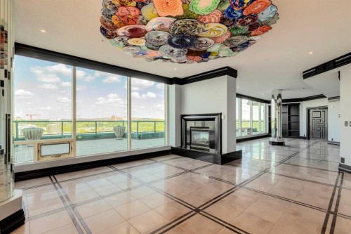 1401-837 2 Avenue Sw, Calgary, AB - Indoor Photo Showing Other Room With Fireplace