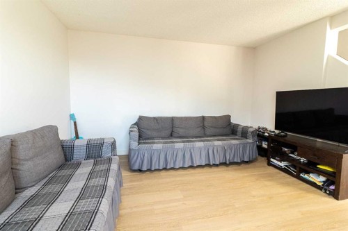 78-1155 Falconridge Drive Ne, Calgary, AB - Indoor Photo Showing Living Room