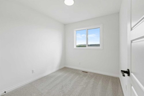 902 Wolf Willow Boulevard Se, Calgary, AB - Indoor Photo Showing Other Room