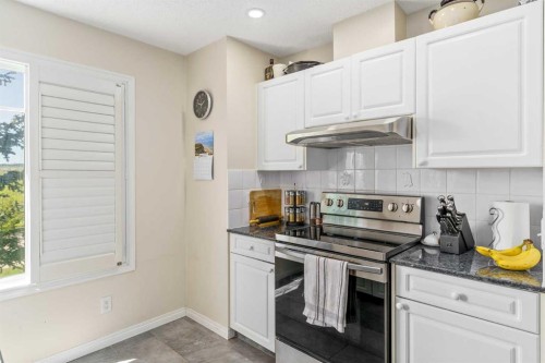 181 Hidden Creek Gardens Nw, Calgary, AB - Indoor Photo Showing Kitchen