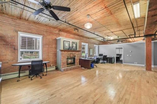 401-535 10 Avenue Sw, Calgary, AB - Indoor With Fireplace