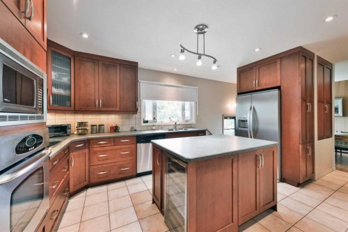 5712 Layzell Road Sw, Calgary, AB - Indoor Photo Showing Kitchen With Double Sink