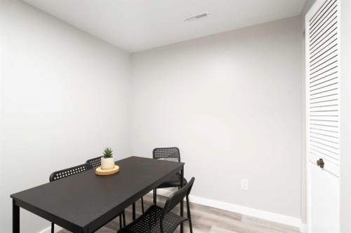 319 Rundlelawn Road Ne, Calgary, AB - Indoor Photo Showing Dining Room