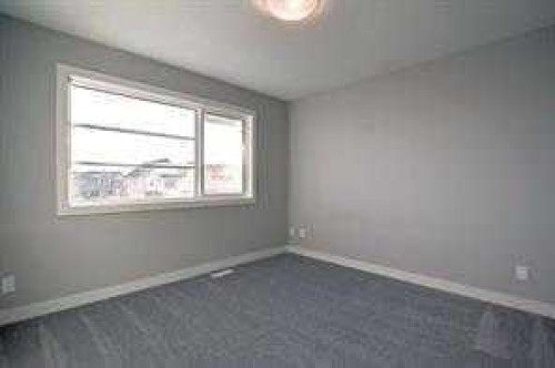 109 Cobblestone Gate Sw, Airdrie, AB - Indoor Photo Showing Other Room