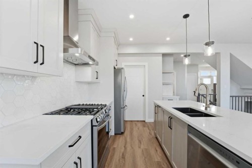 62 Vista Close, Blackfalds, AB - Indoor Photo Showing Kitchen With Double Sink With Upgraded Kitchen