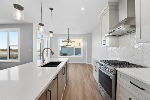 62 Vista Close, Blackfalds, AB - Indoor Photo Showing Kitchen With Double Sink With Upgraded Kitchen