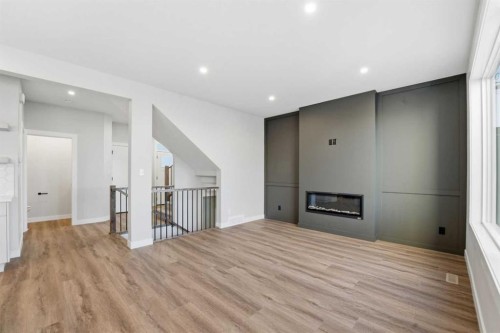 62 Vista Close, Blackfalds, AB - Indoor Photo Showing Other Room With Fireplace